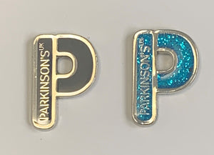 Parkinson's UK "P" navy and cyan blue glitter enamel pin badges twin pack