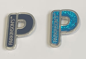 Parkinson's UK "P" navy and cyan blue glitter enamel pin badges twin pack
