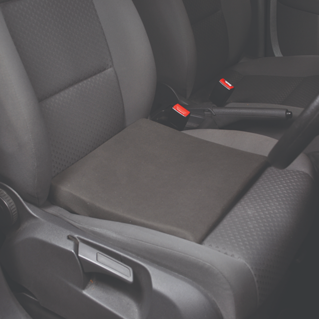 Slimline wedge for car seat comfort with strap