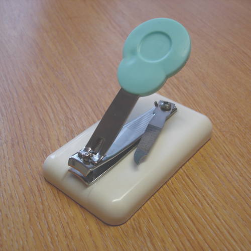 Table top finger nail clipper