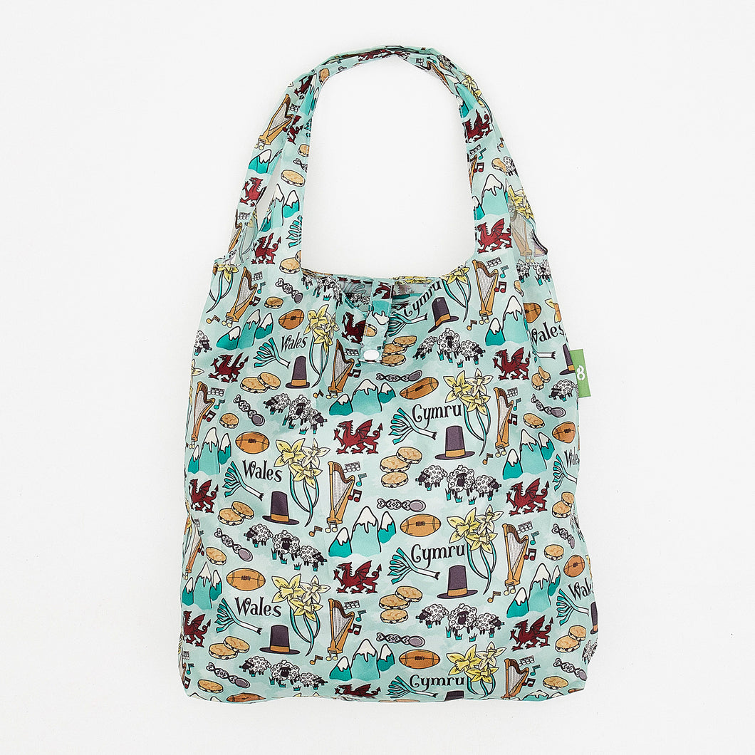 Eco-friendly foldaway shopper with storage pouch made from recycled bottles. Wales icon design.