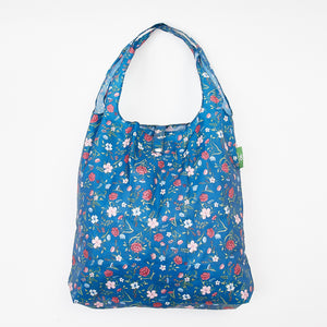 Eco-friendly foldaway shopper with storage pouch made from recycled bottles. Floral design.
