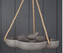 Eco-friendly hanging bird feeder