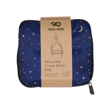 Eco-friendly cross body compact bag made from recycled plastic bottles. Moon and stars design