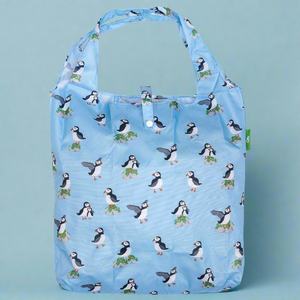 Eco-friendly foldaway shopper with storage pouch made from recycled bottles. Puffin design