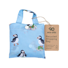 Eco-friendly foldaway shopper with storage pouch made from recycled bottles. Puffin design