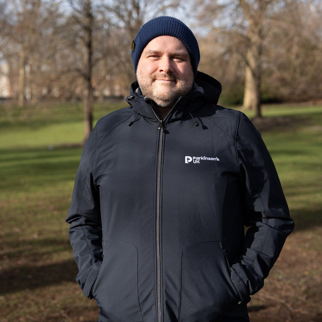 Parkinson's UK unisex sports soft shell jacket in navy made from 63 re ...