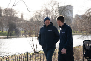 Parkinson's UK unisex sports soft shell jacket in navy made from 63 recycled bottles.