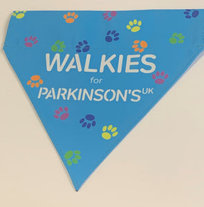 Parkinson's UK walkies dog bandana with colourful paw prints