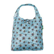 Eco-friendly foldaway shopper with storage pouch made from recycled plastic bottles. Blue bumble bee design